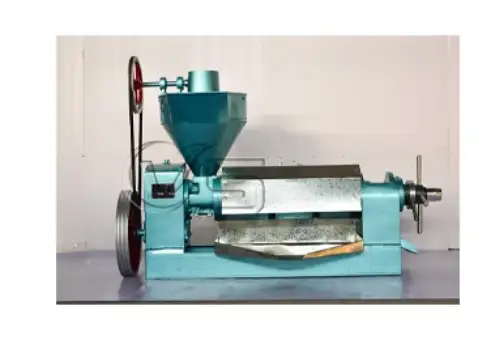 Automatic soybean oil expeller in operation