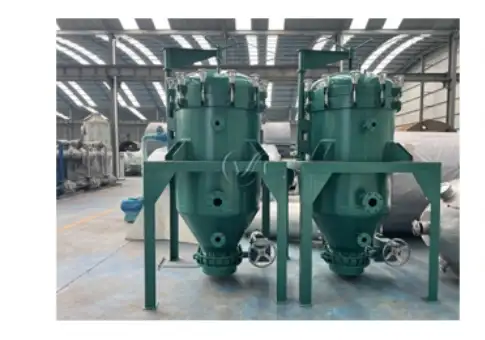Vertical leaf filter system installed in continuous oil refining line